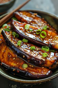 Grilled eggplant slices topped with sesame seeds and chopped green onions in a savory sauce. Japanese Eggplant Recipe Roasted, Japanese Eggplant Recipe, Nasu Dengaku, Glazed Eggplant, Japanese Eggplant, Lavender Scones, Unique Side Dishes, Eggplant Recipe, Miso Glaze