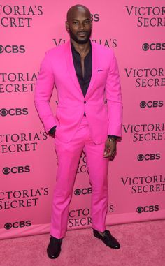 Tyson Beckford from Stars Arrive at the 2015 Victoria's Secret Fashion Show | E! Online Pink Fancy Outfits, Grey Suit Vest, Wedding Suit Men, Real Men Wear Pink, Dress Suit Vest, Men In Pink, Men Suits Wedding, Satin Shawl