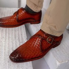 Crafted with passion and the latest design, these red and brown pair of monk shoes are a must-have in your leather shoe collection. Made from high-quality refurbished leather, these shoes have snakeskin textures for excellent fashion appeal. Hand-painted in red and brown, these stylish leather shoes are easy to match with anything you wear. Round toe, flap detailing, and a brass metal buckle strap adds to the elegance. Genuine leather soles will ensure look and comfort at the same time. These ha Brown Monk Strap Shoes With Textured Sole For Business, Luxury Monk Strap Shoes With Textured Sole, Luxury Monk Strap Shoes With Textured Sole For Business, Brown Formal Monk Strap Shoes With Textured Sole, Formal Brown Monk Strap Shoes With Textured Sole, Luxury Monk Strap Shoes With Textured Wingtip Sole, Monk Shoes, High Fashion Branding, Handmade Leather Shoes