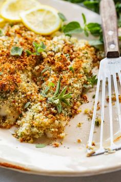 a close up of a plate of food with broccoli and cheese on it