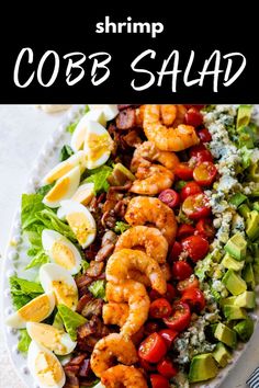 shrimp cobb salad with avocado, tomatoes, lettuce and hard boiled eggs