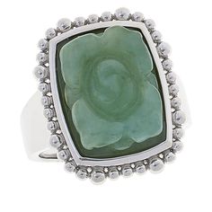 Jade of Yesteryear Carved Jade Flower Sterling Silver Ring Carved green jade blossoms at the center of this contemporary silver ring.       Approx. 13/16"L x 5/8"W x 5/16"H; 1/16"W shank     Stamped .925 sterling silver; platinum plating   Stone Information       All sizes and weights approximate     Light Green Jade - Cushion (16x12mm)     Dark Green Jade - Cushion (16x12mm) Jade Flower, Stone Wedding Ring, Stone Wedding, Carved Jade, Color Bands, Jade Carving, Wedding Watch, Jade Jewelry, Jade Stone