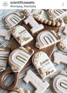 some decorated cookies are laying on a table