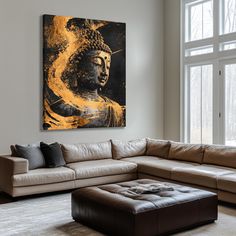 a living room filled with furniture and a large painting hanging on the wall above it