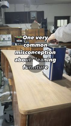 a person is sitting at a desk with a book on it and the caption reads, one very common misconreption about learning furniture