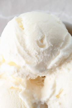 a scoop of vanilla ice cream in a bowl