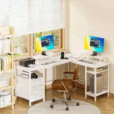 a computer desk with two monitors and a printer on it in front of a window