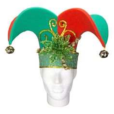 a white mannequin head with three colorful hats on it's head and bells