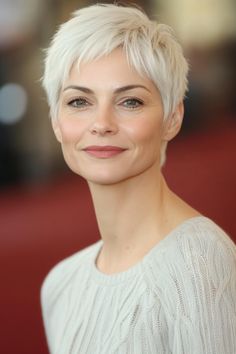 Click for More ➡️ | Save for Later ❤️A sleek, tapered pixie cut that blends sophistication with modern flair. The bright white finish elevates the chicness of this look. (Tapered Pixie with Sleek White Finish - Haircuts For Older Women With White Hair)