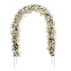 an arch decorated with white flowers and greenery for a wedding ceremony or special occasion