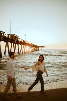 couples beach photoshootvintage beach couplessunset photosengagement photos Beach Boardwalk Engagement Photos, Dreamy Beach Photoshoot Couple, Beach Fall Photoshoot, Boardwalk Couple Pictures, Lesbian Couple Photoshoot Poses Beach, Sunset Beach Engagement Shoot, Waterfront Engagement Photos, Sunrise Beach Photoshoot Couple, Boardwalk Engagement Photos