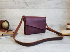 "Welcome to LeatherPleasureUA, the shop of craft leather goods! All the products here are of my own design, and every item is handcrafted from the high-quality genuine leather with a great care put into every single detail. I am always happy to help you to choose the item you need and answer any of your questions.🧡 Every product is custom-made. A bag from the LeatherPleasureUA will become more than just an accessory for you. It can reflect your personality, your story, and your life experience Cheap Leather Handheld Box Bag, Cute Shoulder Bag, Handmade Leather Purse, Simple Leather, Minimalist Gifts, Personalized Gifts For Her, Bag Cute, Leather Bag Women, Bag Handmade