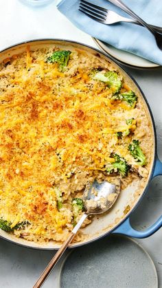 a casserole dish with broccoli and cheese