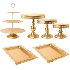 a set of three tiered trays with two serving plates and one cake stand