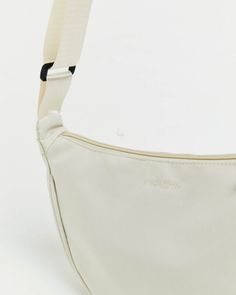 The Cendre Satchel Bag by Insight comes in a cream colourway. The bag is a half moon shape with an adjustable strap and zipper closure. Destination Dress, Teen Shopping, Moon Shape, The Bag, Satchel Bag, Skirted Swimwear, Half Moon, Denim Shop, Satchel Bags