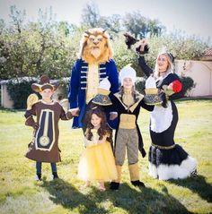 a group of people in costumes posing for a photo