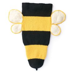 a black and yellow knitted bee mask