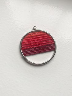 "These seed beaded pendant necklaces on unique chains are sure to complement any outfit. Comes in two shapes: oval and circle. Circle size: 2\" in diameter. Oval size: 2.5\" in length, 1.5\" wide 30 inch chains have extenders."