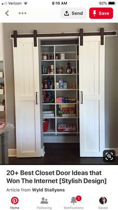 an open pantry with sliding doors and shelves