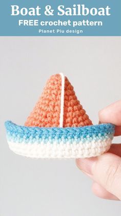 a crocheted boat and sailboat is featured in this free pattern