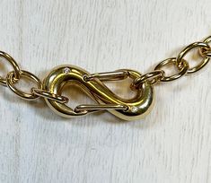 "Beautiful S lock necklace with inlayed CZ's on both sides of lock Gold fill top layer Lock opens to add charms if desired Chain is 17\" (adjustable to 19\") Oval cable chain has 11mm x 7mm link Links can be opened (they are not soldered) to shorten Clasp available separately in this listing Bracelet not included- It is for idea purposes for jewelry making. Fancy curb Chain is also available in my shop. ✨If you would like this shortened please put in messages to seller when you buy. I will be ha Beautiful S, Beautiful Pearl Necklace, Lock Necklace, Necklace Design, Cz Necklace, Curb Chain, Cable Chain, Necklace Designs, Design Inspo