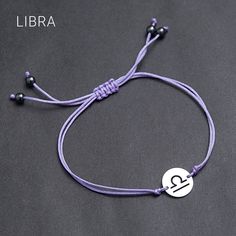 Libra Zodiac string bracelet.  Adorn your wrist with the Libra sign cord bracelet. Carry the power of your zodiac with you! Components: ♦ Hematite beads, 4-6 mm  ♦ Polyester cord  ♦ Titanium/316L Stainless steel bead and charm, no tarnish, no rust Benefits of Titanium/316L Stainless steel: - Never fade - Medical materials - Anti-allergy HEMATITE  * Grounding * Calming * Removes Negativity * Self-Confidence * Improves Relationships * Focus *   Astrological signs: Aries, Aquarius Primary Chakra: R Symbolic Adjustable Friendship Bracelets, Adjustable Zodiac Sign Bracelet As Gift, Adjustable Zodiac Sign Bracelets As Gift, Celestial Bracelet, Mens Stretch Bracelets, Bachelor Gifts, Libra Sign, Bracelet Friendship, Packing Jewelry