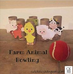 farm animal bowling game on the floor with paper animals