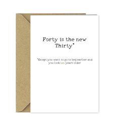 a white card with the words forty is the new thirty in black ink on it