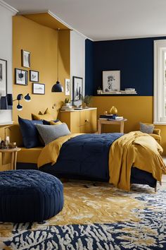 a bedroom with yellow and blue walls, an ottoman, and a bed in the middle