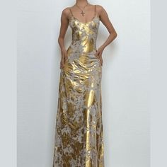 Please refer to our sizing chart for a guideline when choosing a size. 5 business days order processing time. 90% polyester 10% spandex Metallic Maxi Dress For Party Season, Gold Backless Maxi Dress, Gold Spaghetti Strap Maxi Dress For Summer, Gold Maxi Dress With Spaghetti Straps For Summer, Chic Gold Maxi Dress With Spaghetti Straps, Gold Backless Maxi Dress For Prom, Gold Maxi Length Slip Dress For Party, Gold Fitted Maxi Length Slip Dress, Gold Spaghetti Strap Maxi Dress For Prom