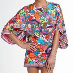 - Multicolored Fiji Flower Print - Banded With Contrasting Border Envelops - Open Back With Ties - Kimono Sleeves - 91% Nylon, 9% Spandex - Hand Wash Cold Separately, Line Dry - Size L (Measurements Lying Flat And Undtretched, Please See Photos For Measurement)(First Three Photos Are Stock, Only Shows Look) - New Without Tag, In Excellent Condition Vibrant Tropical Print Short Sleeve Dress, Tropical Multicolor Mini Dress For Party, Colorful Floral Print Vacation Dresses, Colorful Printed Vibrant Dresses, Colorful Floral Print Dress For Vacation, Vibrant Tropical Print Multicolor Dress, Multicolor Vibrant Print Dress, Vibrant Multicolor Tropical Print Dress, Vibrant Multicolor Floral Print Dresses