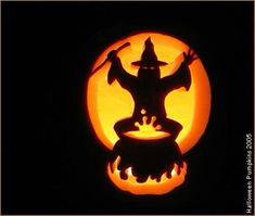 a carved pumpkin with an image of a witch on it