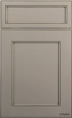 an image of a kitchen cabinet door and drawer set in grey color with white trim