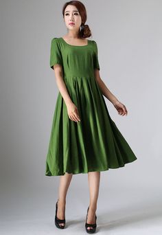 "This Prairie Linen dress is designed with soft linen in forest green hues, perfect with Puff sleeve, round neckline, and back button closure, This womens swing dresses can be styled with light weight a accessories for a daring ensemble . vintage inspired design, Handmade by Xiaolizi. DETAILS 50% linen, 50% Cotton, Medium weight Linen No lining Square neckline Short Puff Sleeve Seam pockets Back Zipper Below Knee length Spring, Summer House dress More color and More size https://etsy.me/2TGUAgq Green Linen Dress, Scoop Neck Midi Dress, Handmade Skirts, Outfit Party, Wool Clothing, Vintage Inspired Dresses, Prairie Dress, 50s Dresses, Mod Dress