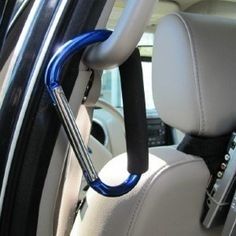 the interior of a car with a blue handle