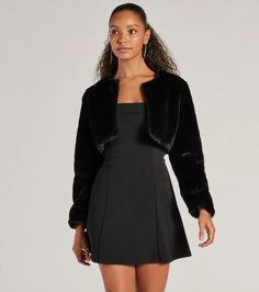 Add a touch of luxury to your ensemble with this elegant faux fur crop jacket. Its plush fabric gives an opulent feel, perfect for adding sophistication to any look. The jacket's cropped length makes it a chic pairing with cocktail dresses, formal jumpsuits, or dressy pants ensembles. With its clean, collarless design and discreet front fastening, this jacket offers a modern take on classic bolero styling.Fit & FeaturesDraped open frontLong sleevesCropped hem Soft faux fur fabricSatin-like w Faux Fur Bolero, Fur Bolero, Faux Fur Cropped Jacket, Formal Jumpsuit, Dressy Pants, Fur Fabric, Bolero Jacket, Faux Fur Fabric, Fur Fabrics