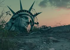 the statue of liberty is surrounded by debris