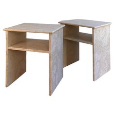 two wooden tables sitting next to each other