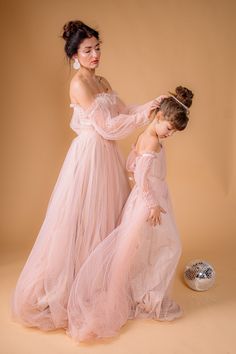 Mother Daughter Dress, Polka Dot Blush Dress, Matching Mommy And Me Dress Long blush pink polka dot tulle dresses with with train, corset type top part with lace up. Sleeves are detachable, Dresses are decorated with lace. Feel like qeen and princess during your event or photoshoot. Different colors and color combinations are possible, contact me to discuss. SIZES AND CUSTOMISATION Dresses are tailored to order in any standart size. For better fit you can leave your measurements with your order Floor-length Tulle Gown For Ceremony, Pink Tulle Dress For Ceremony, Pink Floor-length Ceremony Dresses, Wedding Night Dress With Fitted Bodice And Tulle, Tulle Wedding Night Dress With Fitted Bodice, Baby Blue Maternity Dress, Mommy And Me Dress, Off Shoulder Ball Gown, Daughter Dress