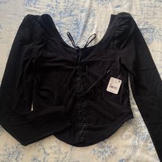 Nwt Free People Black Blouse, Laced Up Front. Give Stevie Nicks Energy In This Adorable 70s Blouse! Fitted Black Long Sleeve Top For Summer, Black Long Sleeve Cotton Blouse, Black Fitted Long Sleeve Top For Spring, Long Sleeve Cotton Crop Top For Night Out, Fitted Black Long Sleeve Top For Spring, Black Long Sleeve Cotton Crop Top, Black Stretch Long Sleeve Top For Night Out, Trendy Black Stretch Blouse, Cotton Tops For Fall Party