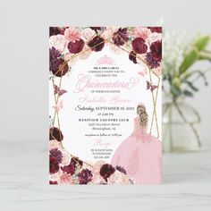 a pink and purple wedding card with flowers on the front, featuring an image of a bride's dress