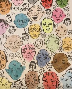 an image of many different faces drawn on paper