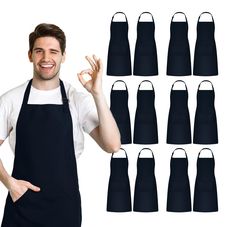 a man in an apron is holding his hand up to the side and eight black aprons behind him