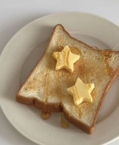 a piece of toast with butter and syrup on it