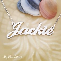 Order any word or name, for your new Sterling Silver 925 Jackie style name necklace!A great gift for any occasion!*Nameplate and chain are all solid sterling silver 925.*Larger nameplate is 1.4 cm tall (0.6 inches)*Nameplate is 1.2 mm thick.*This listing is for one (1) name with one (1) capital letter.*Choose your chain length and style from the menus above!*Be sure to tell me the name or word that you would like in the NOTE TO SELLER section of your etsy checkout!If you liked this item you can Custom Nameplate Necklace In White, White Custom Nameplate Necklace, Custom Name White Gold Nameplate Necklace, Classic Sterling Silver Initial Pendant Name Necklace, Silver Initial Pendant Name Necklace, Sterling Silver Name Necklace For Personalized Gift, Personalized White Sterling Silver Name Necklace, Classic Sterling Silver Initial Pendant Necklace, Sterling Silver Initials Name Necklace For Birthday