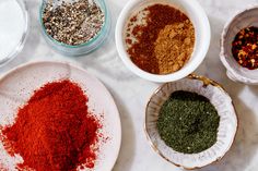 bowls filled with different kinds of spices