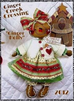 a teddy bear is dressed in a dress and holding a sign that says ginger crossing