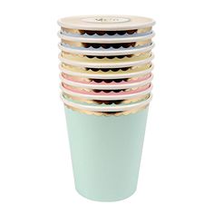 a stack of coffee cups sitting on top of each other