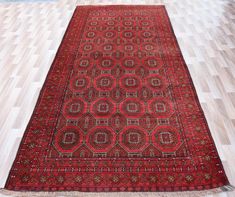 You are Welcome TO My Shop { Kamran Carpets } 10ft Oversized Hallway Runner Rug - Afghan Handmade Antique Runner Rug - Traditional Vintage Rug - Nomadic Tribal Rug - 4.10x9.11 ft Rug Key Features: Size: 150 x 303 Cm \ 4.10 x 9.11 Ft ideal for large spaces, adding vibrancy and warmth. Material: Made from 100% natural wool, offering a soft texture and excellent durability. Design: A bold geometric pattern featuring interlocking shapes and intricate motifs, inspired by traditional Afghan artistry. Colors: A striking palette of vibrant Red and Blue balanced. Craftsmanship: Hand-knotted using time-honored techniques, ensuring a unique, high-quality rug. Why Choose This Rug? Timeless Appeal: Its bold geometric design and vibrant colors create an eye-catching focal point. Durable and Practical: W Interlocking Shapes, Rug Traditional, Hallway Runner Rug, Hallway Runner, Seating Arrangements, Soft Texture, Soft Textures, Natural Wool, Vibrant Red