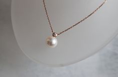 A combination of two birthstones for April (diamond) and June (pearl), the Saltwater Pearl & Diamond Necklace is a finishing piece for any classy occasion. Pairing suggestion:Saltwater Pearl & Diamond EarringsDimensions:Chain length: 40 cm, adjustable up to 42 cm (approx. 15.7 to 16.5 in) Materials used (pictured):14K solid rose gold, 1.44 g1 x saltwater pearl, 7 mm1 x champagne diamond, 0.1 ct Elegant Pear-shaped Single Diamond Necklace, Elegant Birthstone Jewelry, Elegant Wedding Necklace With Single Diamond, Elegant Single Diamond Necklace For Wedding, Elegant Pearl Necklace With Birthstone For Anniversary, Elegant Diamond White Jewelry With Birthstone, Formal Pear Shaped Single Diamond Jewelry, Elegant Pearl Jewelry With Birthstone, Elegant Pearl Necklace With Birthstone For Wedding